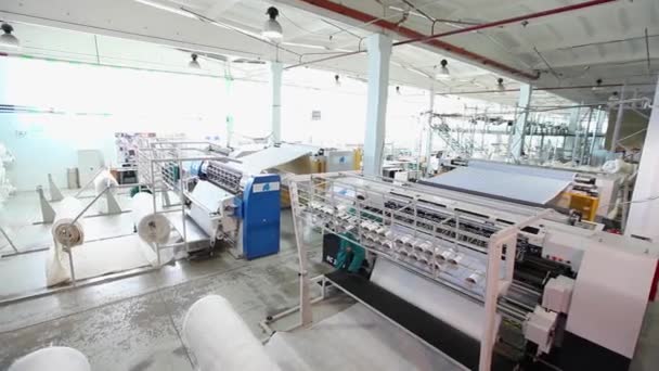 depositphotos_180116232-stock-video-textile-factory-textile-industry-warping